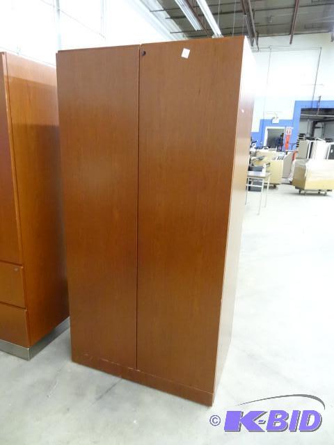 2 door laminate cabinet. 4 shelves....