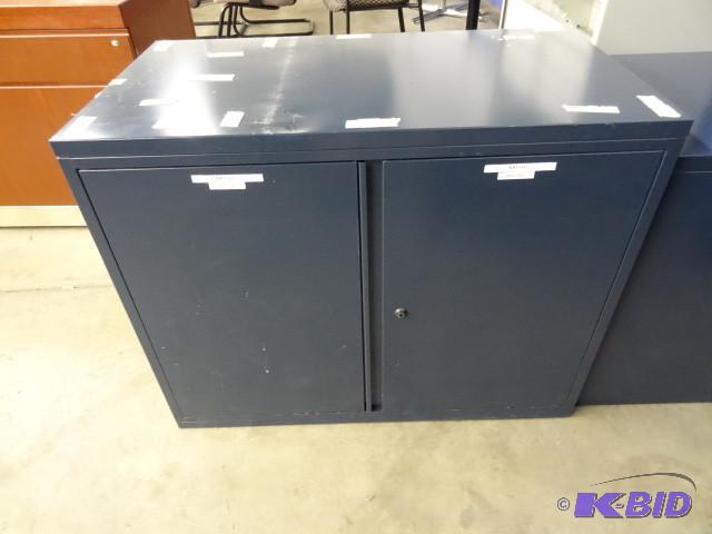 Metal 2 door cabinet. 36 x 20 x 28...