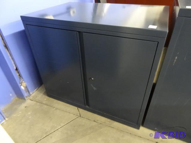 Metal 2 door cabinet. 36 x 20 x 26...