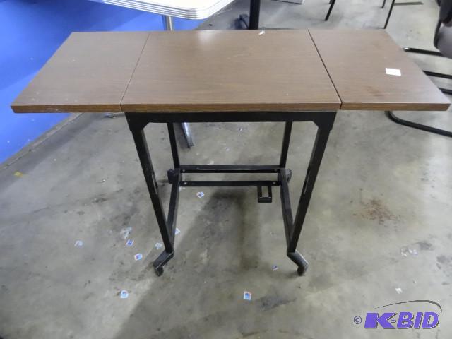 Type writer table. Fold down sides...