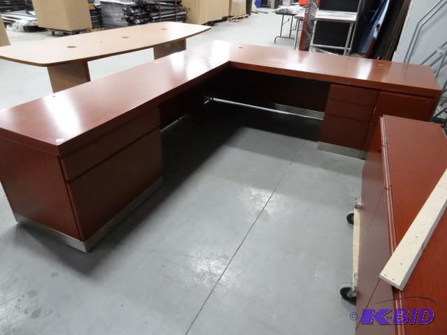L shaped desk with wall hanging hut...