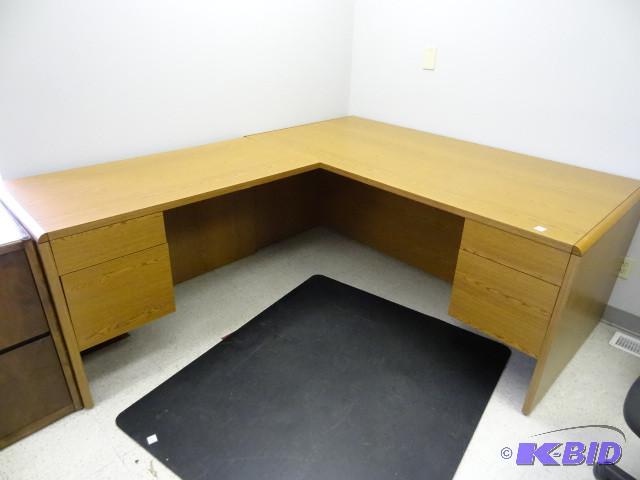 L shaped office desk. 2 piece. 4 dr...