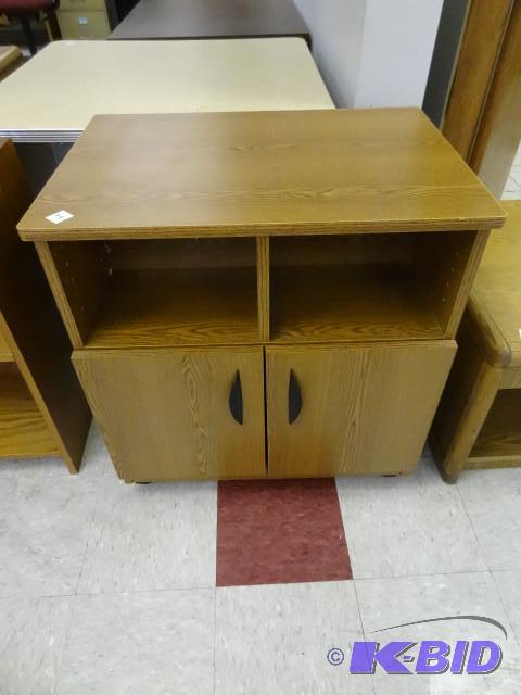 Laminate cabinet on wheels. 28 x 20...