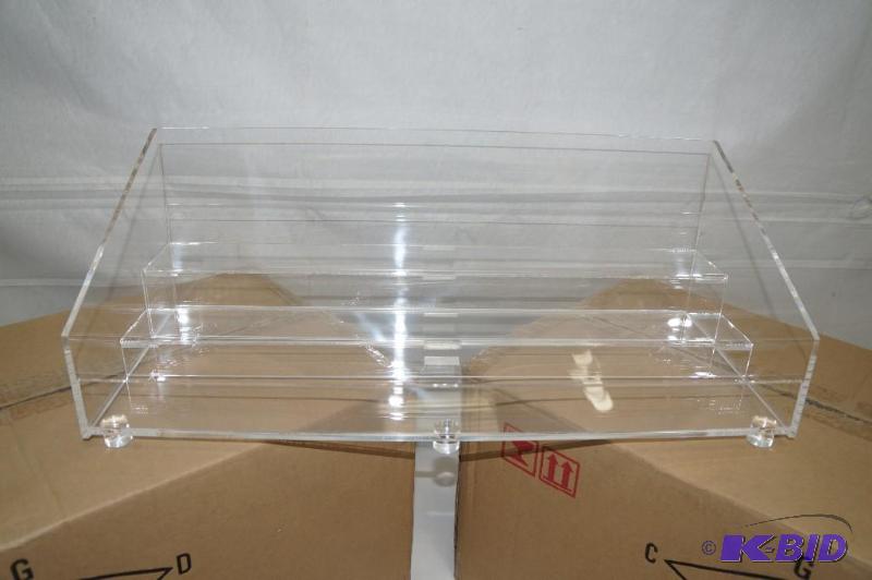 lot 27 image: New, Still in Box Acrylic Countertop Displays (Set of 3)