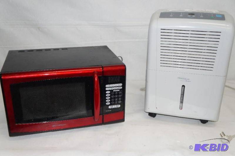lot 63 image: Emerson Microwave and a Soleus Dehumidifer