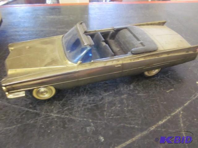 Vintage plastic 9 inch Cadillac car...