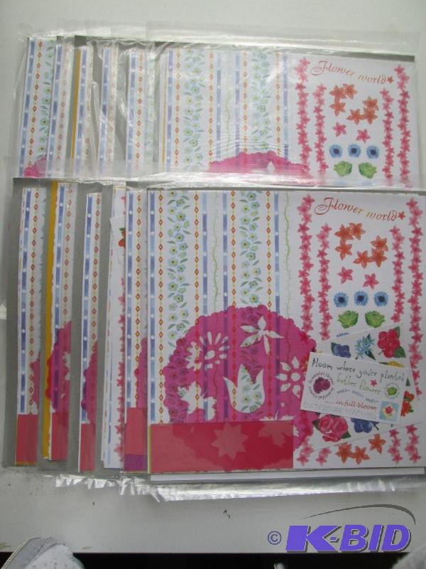 Lot of 12 packages of scrapbook pap...