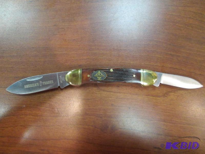 Nice folding pocket knife with wood...