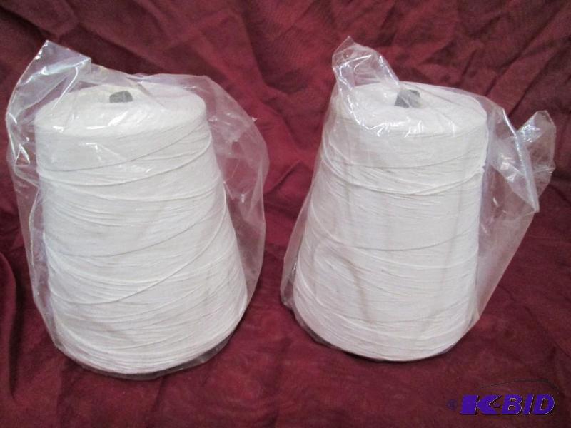 2 large spools of white packaging s...