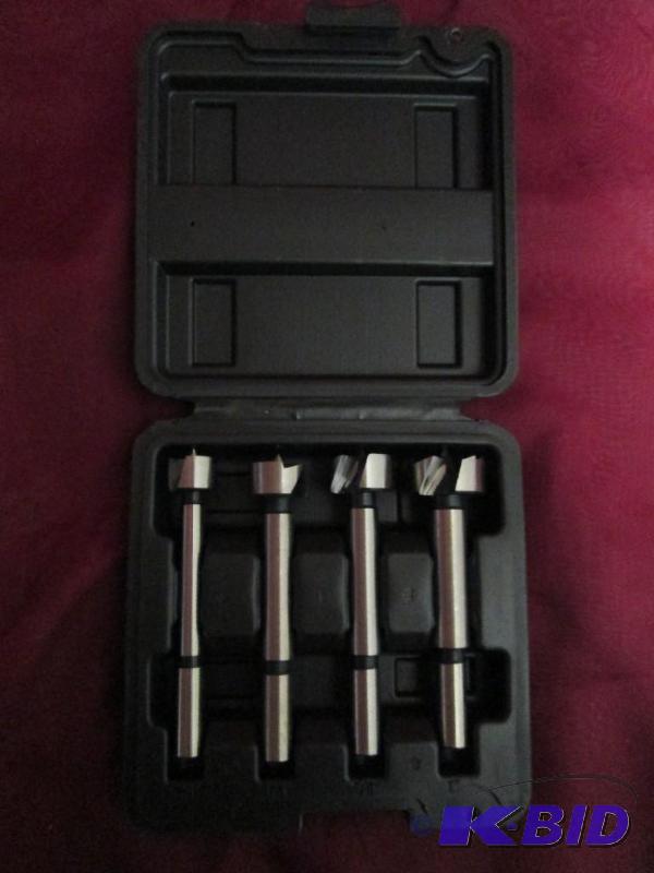 4-piece set of specialty bits in a ...