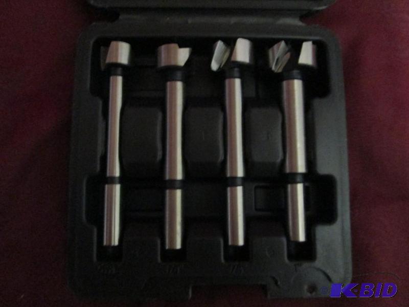 4-piece set of specialty bits in a ...
