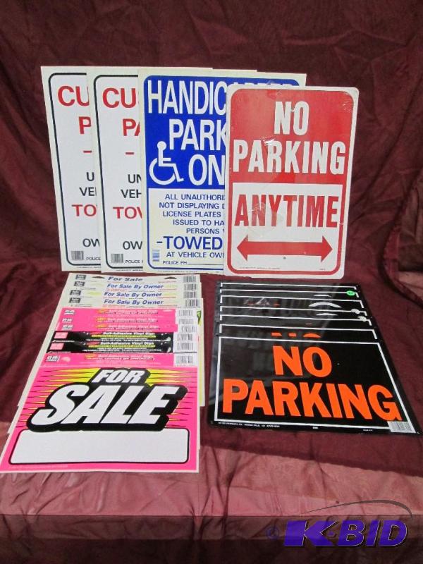 Lot of new parking lot and sale sig...