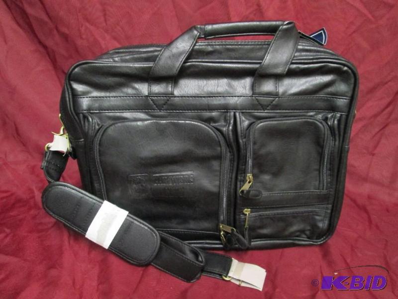 New leather brief case with plenty ...