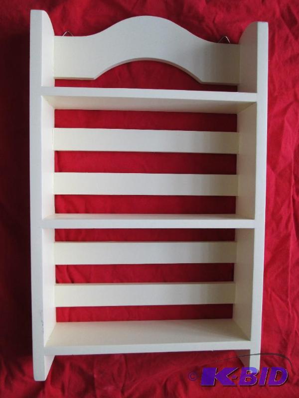 Nice cream colored three tier shelf...
