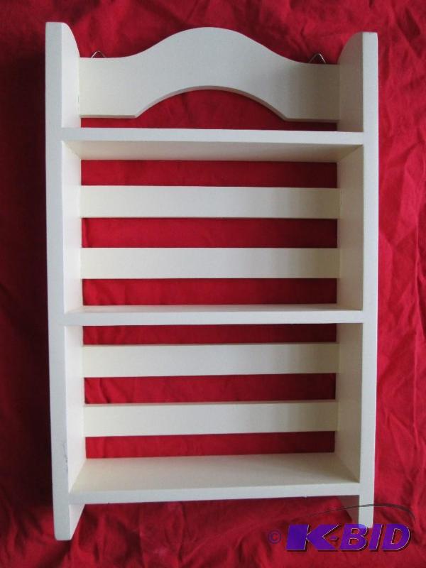 Nice cream colored three tier shelf...