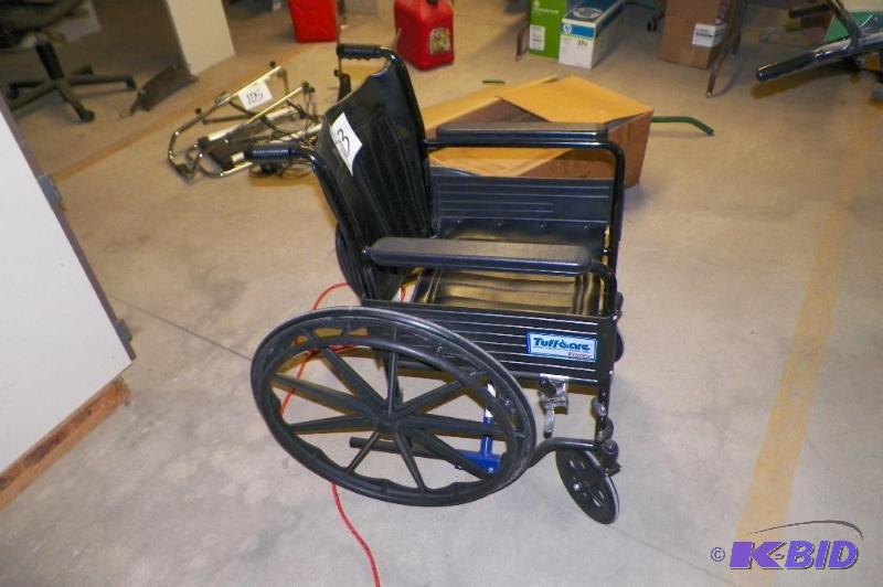 lot 103 image: Folding Wheel Chair