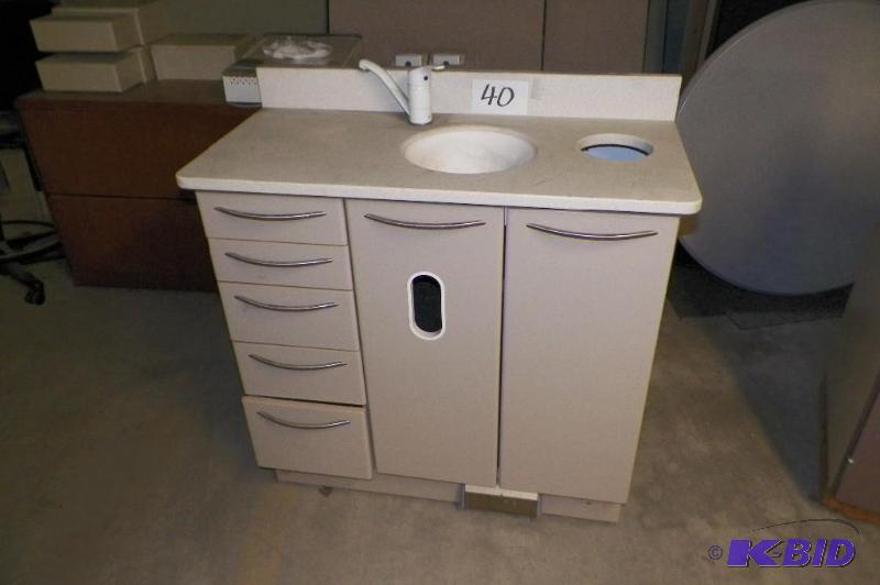 lot 40 image: Sink Cabinet with Corian Type Top