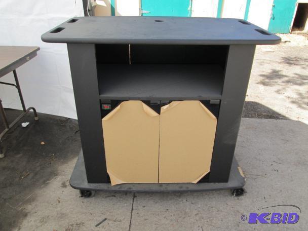 lot 17 image: Media center type cart on wheels. 3...