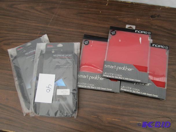 lot 40 image: 3 pc. iPad 2 ultra thin cases &...