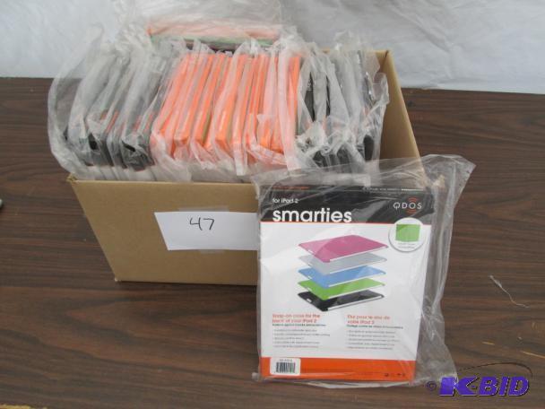 lot 47 image: QDOS Smarties iPad 2 snap on covers...