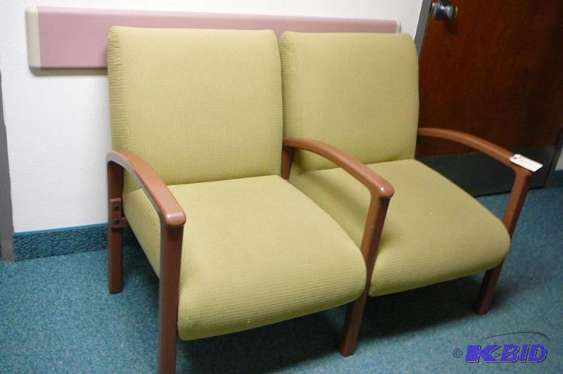 Green waiting room chairs 2 side by...