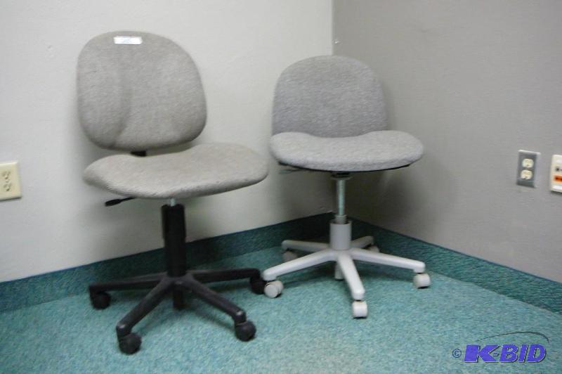 2 adjustable gray office chairs wit...