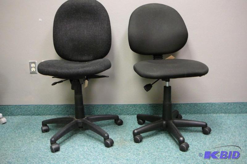 2 adjustable black office chairs wi...