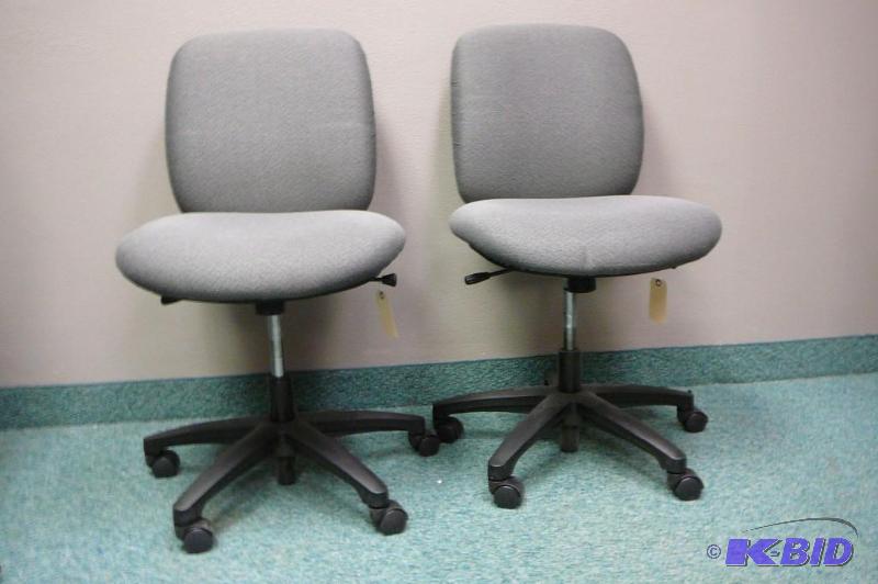 2 adjustable gray office chairs wit...