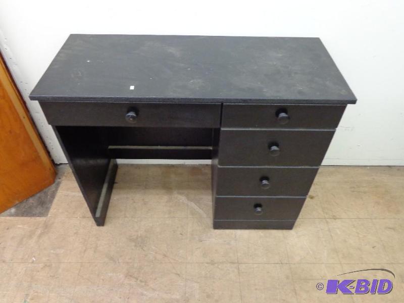 lot 5 image: 5 Drawer Desk Made out of Press Boa...