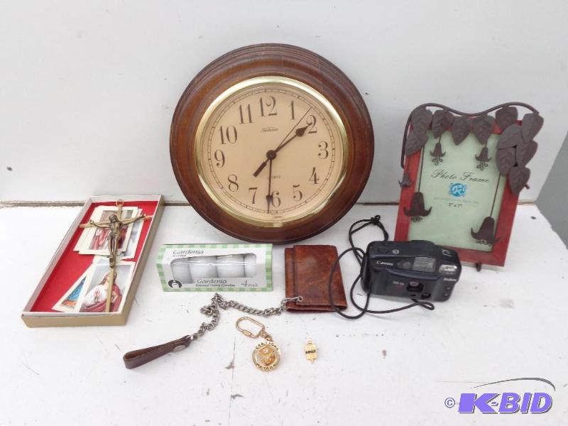 lot 55 image: Crucifix, Clock , 4 Pack of Candles...