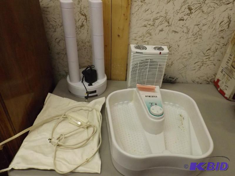 This lot includes a foot bath that ...