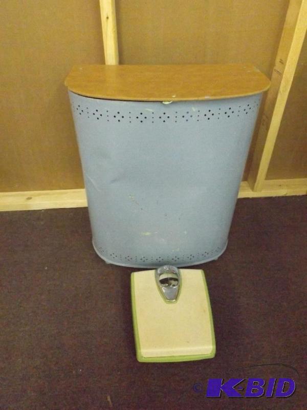 Vintage tin clothes hamper which ha...