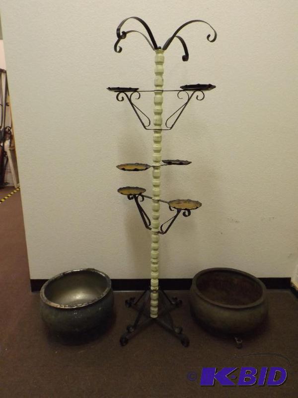 This lot includes a plant stand and...