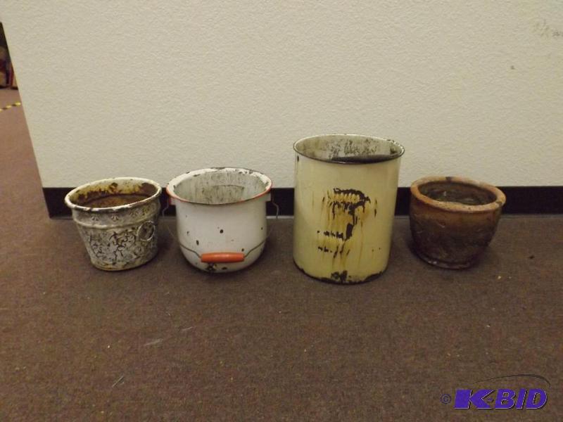 This lot includes 4 pots, two of th...