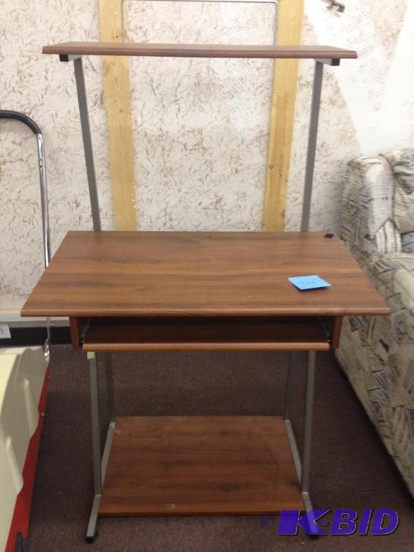 This lot includes a desk that is in...