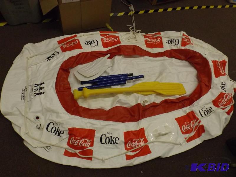 Coke Cola blow up three person boat...