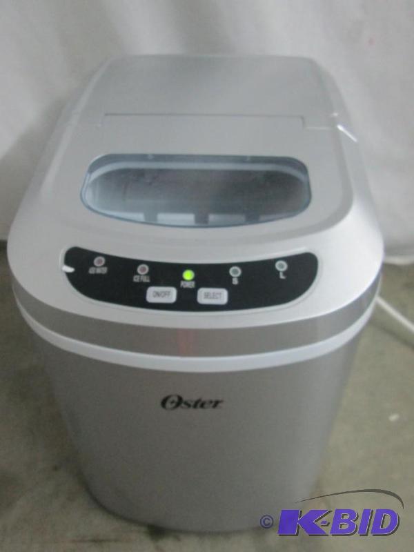lot 24 image: Oster Portable Ice Maker