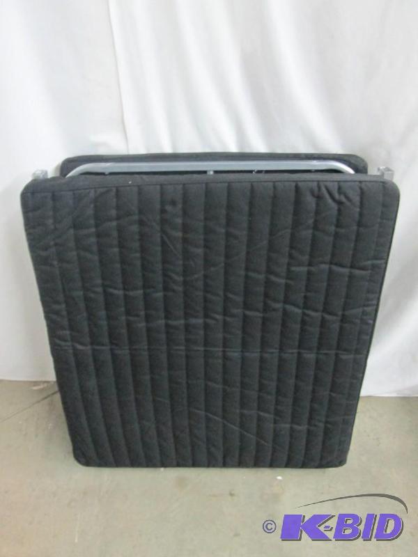 lot 25 image: Compact Folding Rollaway Bed