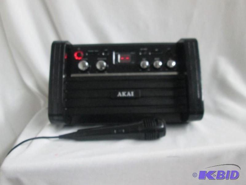 lot 27 image: AKAI Karaoke Player with iPadiPod Cradle & Lights