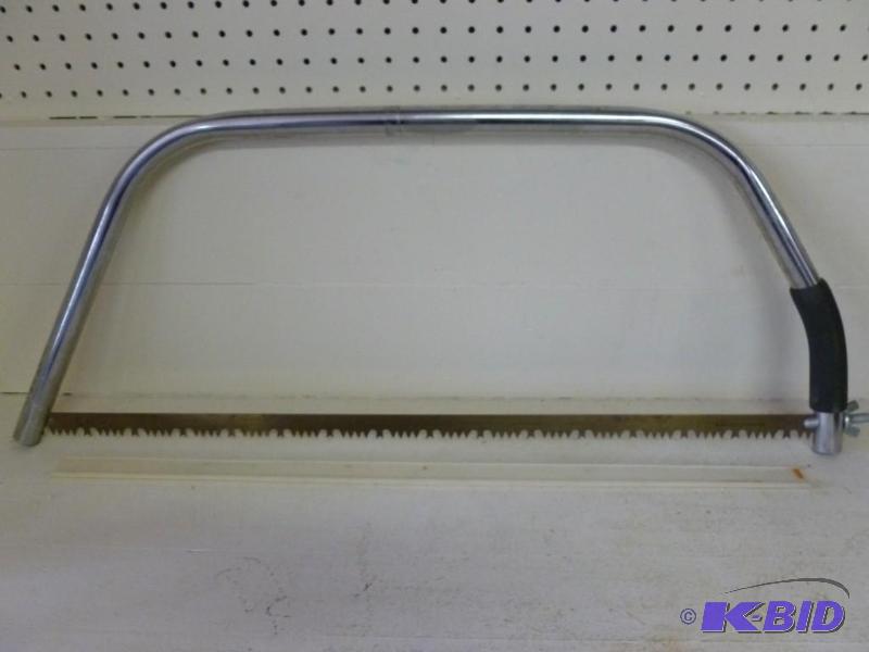 lot 208 image: Large metal framed bow saw that mea...