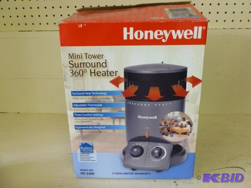 lot 34 image: Honeywell mini tower surround 360 d...