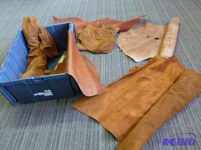 lot 47 image: Large lot of three rolls of leather...