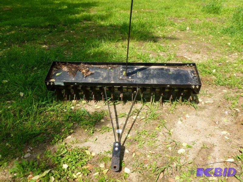 lot 5 image: Heavy duty pull behind lawn thatche...