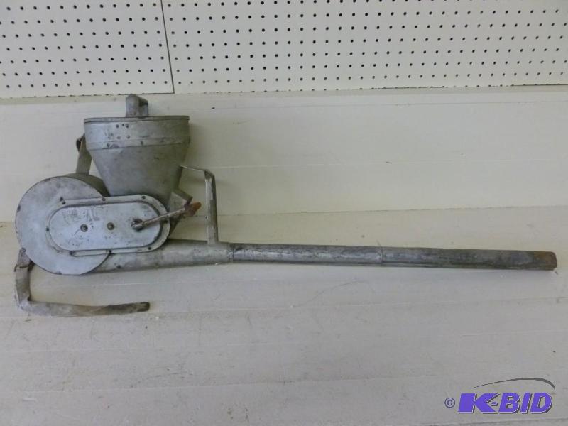 lot 51 image: Large antique metal chicken duster ...