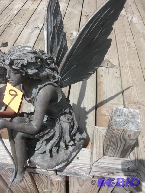 Water fountain Angel, sitting on a ...