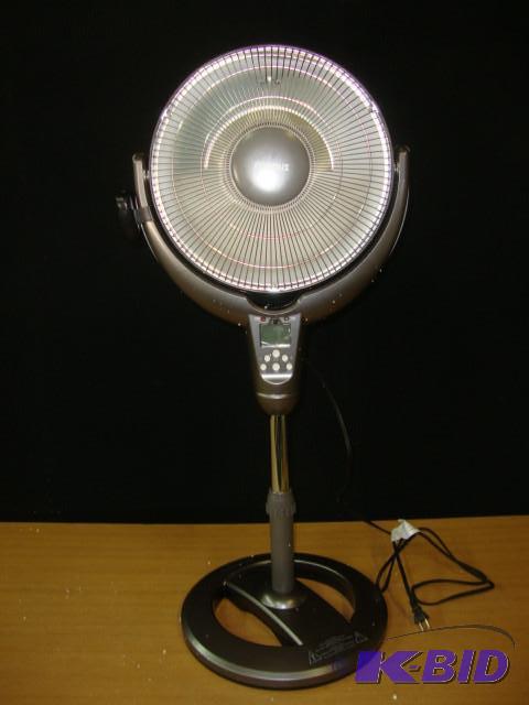 lot 16 image: Optimus 1200W Heater, powers on...