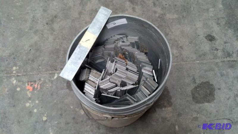 Bucket of metal spacers
