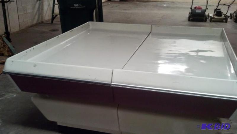 2 produce end tables with one riser.