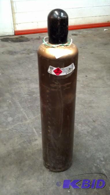 Gold and black top 73lb Acetylene welding tank