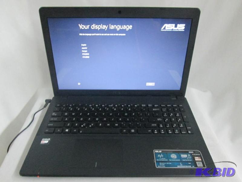 lot 2 image: ASUS 15.6 4GB Windows 8 Laptop